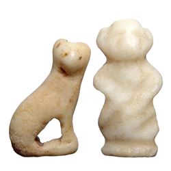 A pair of Egyptian bone amulets