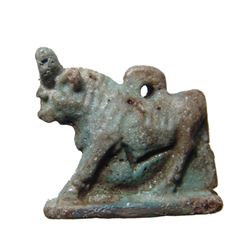 Egyptian blue-green faience amulet of the Apis Bull