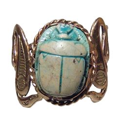 An Egyptian scarab mounted in a gold ring