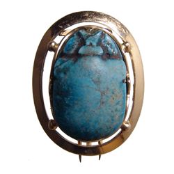 A 14k gold pin set with a nice Egyptian scarab