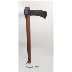 European iron axe-head mounted on a wood shaft