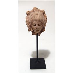 Greek terracotta head of a woman