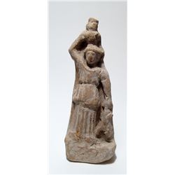 A Roman terracotta figure of a woman