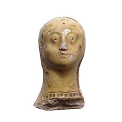 Byzantine female head with yellow glaze