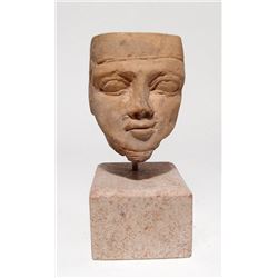 An Egyptian limestone head of Amun-Re, Late Period