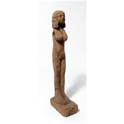 An Egyptian wood tomb figure of a woman