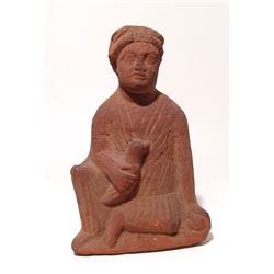 A Cypriot terracotta seated figure