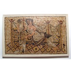 A lovely Roman mosaic depicting a reclining woman