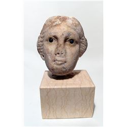 A Roman marble head of a woman