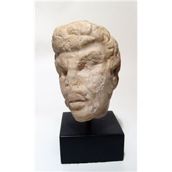 A Roman marble head of a satyr