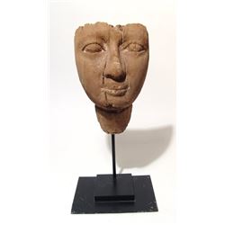 An attractive Egyptian wooden ‘mummy’ mask