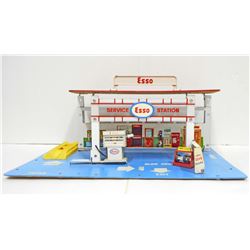 C. 1970S  ESSO TIN LITHO & WOOD FOLD UP GAS STATION TOY