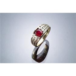 18-Karat Yellow Gold, Ruby and Diamond Dinner Ring Set with an oval faceted ruby w...