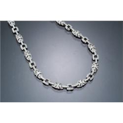 Choker Length 18-Karat White Gold and Diamond Necklace Set with approximately five...