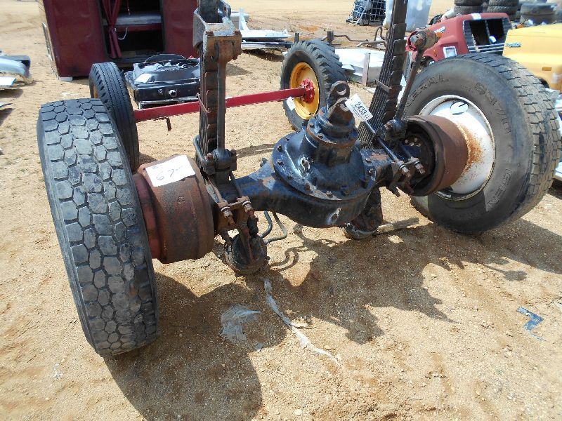 TRUCK TRACTOR DRIVE AXLE W/TIRES & RIMS J.M. Wood Auction Company, Inc.