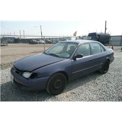 99 Toyota Corolla 4 Dr  Sedan - ST - DRIVE
