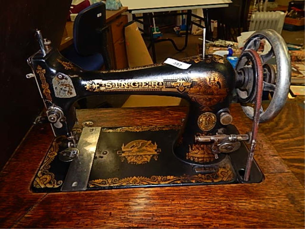 VINTAGE SINGER TREADLE SEWING MACHINE WITH LEATHER PULLY BELT IT