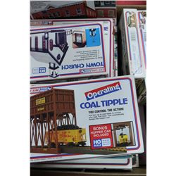 BOX OF UNBUILT HO SCALE BUILDINGS
