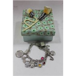 16 STERLING SILVER CHARMS ON BRACELET