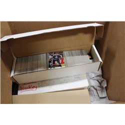 BOX WITH NHL AND NBA CARD SETS