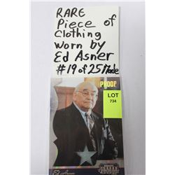 PIECE OF CLOTHING IN CARD  WORN BY ED ASNER