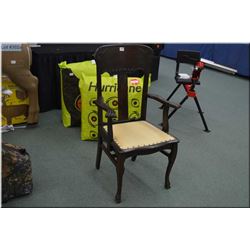 Antique Oak Diner/ Arm Chair w/ carved lion's paw feet on arms & front legs, / w/ pale cream upholst