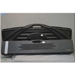 Lot  : Two Black Plastic Gun Cases [ foam lined, one is Flambeau double size , & one Gun Guard ]