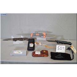 Lot of Four New Knives : 3 folding Gerber knives & 1 small hand made knife w/leather sheath