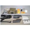Image 1 : Tray Lot : web sling - SIG composite part - bipod - Military cleaning kit - Bushnell 15 - 45 Zoom sp