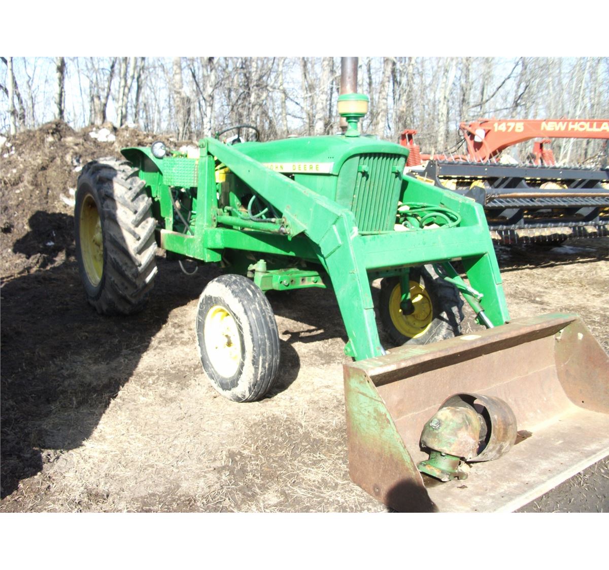JOHN DEERE 2010 TRACTOR WITH FRONT END LOADER BUCKET