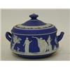 Image 1 : A WEDGWOOD DARK BLUE JASPER DIP COVERED BOWL, twin handled, classical subjects, height 12cm  30-4...