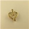 Image 1 : ONE 10KT YELLOW GOLD DIAMOND SET HEART SHAPED PENDANT SET WITH 18 ROUND BRILLIANT CUT DIAMONDS