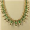 Image 2 : ONE 14KT YELLOW GOLD NATURAL EMERALD AND WHITE TOPAZ NECKLACE. MADE IN A CLASSIC, CASCADING IN LINE