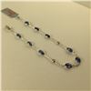 Image 2 : ONE 14KT WHITE GOLD NATURAL BLUE SAPPHIRE AND DIAMOND SET BRACELET. SET WITH 2 ROUND BRILLANT