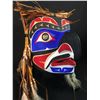 Image 2 : EMIL THIBERT, HAWKMAN MASK, HAND CARVED WITH ABALONE INLAY, CEDAR BARK AND FEATHERS  11" H X 10" W