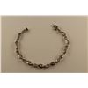 Image 2 : ONE 10KT WHITE GOLD LADIES DIAMOND BRACELET MEASURING 7.5 INCHES, 4 CLAW SET WITH 121- 0.0005CT