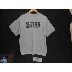 FLASH THE STAR LABORATORIES SCREEN USED TEE SHIRT