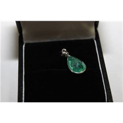 #63 14 KT GOLD EMERALD 2.7CT AND DIAMOND PENDANT