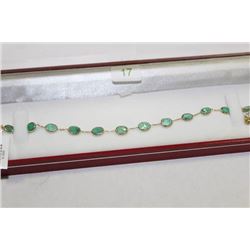 #17 14 KT GOLD EMERALD 5.2CT BRACELET