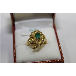#62 18 KT GOLD EMERALD 1CT AND DIAMOND 0.1CT RING