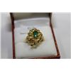 Image 1 : #62 18 KT GOLD EMERALD 1CT AND DIAMOND 0.1CT RING