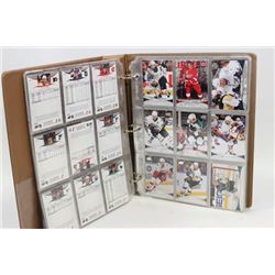 BINDER W/ ARTIFACTS HOCKEY CARDS