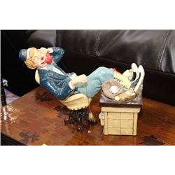CLOWN FIGURINE, AT THE DESK