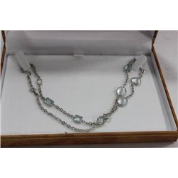 #152  NATURAL AQUAMARINE AND 10 KT WHITE GOLD