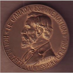 Medal; Le Canada est une Nation - J.L. Tarte Commissaire General, reverse; Exposition International 
