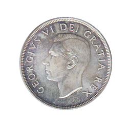 Silver dollar 1949 CCCS MS-67, a strong strike with better lustre and light golden toning.
