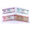 Image 1 : Run of 4 different denominations of 1965 Bahamas banknotes.  $1/2, $1, $3, and $5.  Grades range fro
