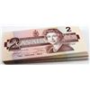 Image 2 : 74 different 1986 $2.00 notes with 74 different prefix`s all in UNC or better condition
