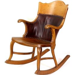 Antique oak rocker with curved and leather