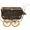 Image 1 : Antique baby buggy with top.